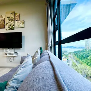 Sunset Seaview Vacation @ Jesselton Quay Apartment